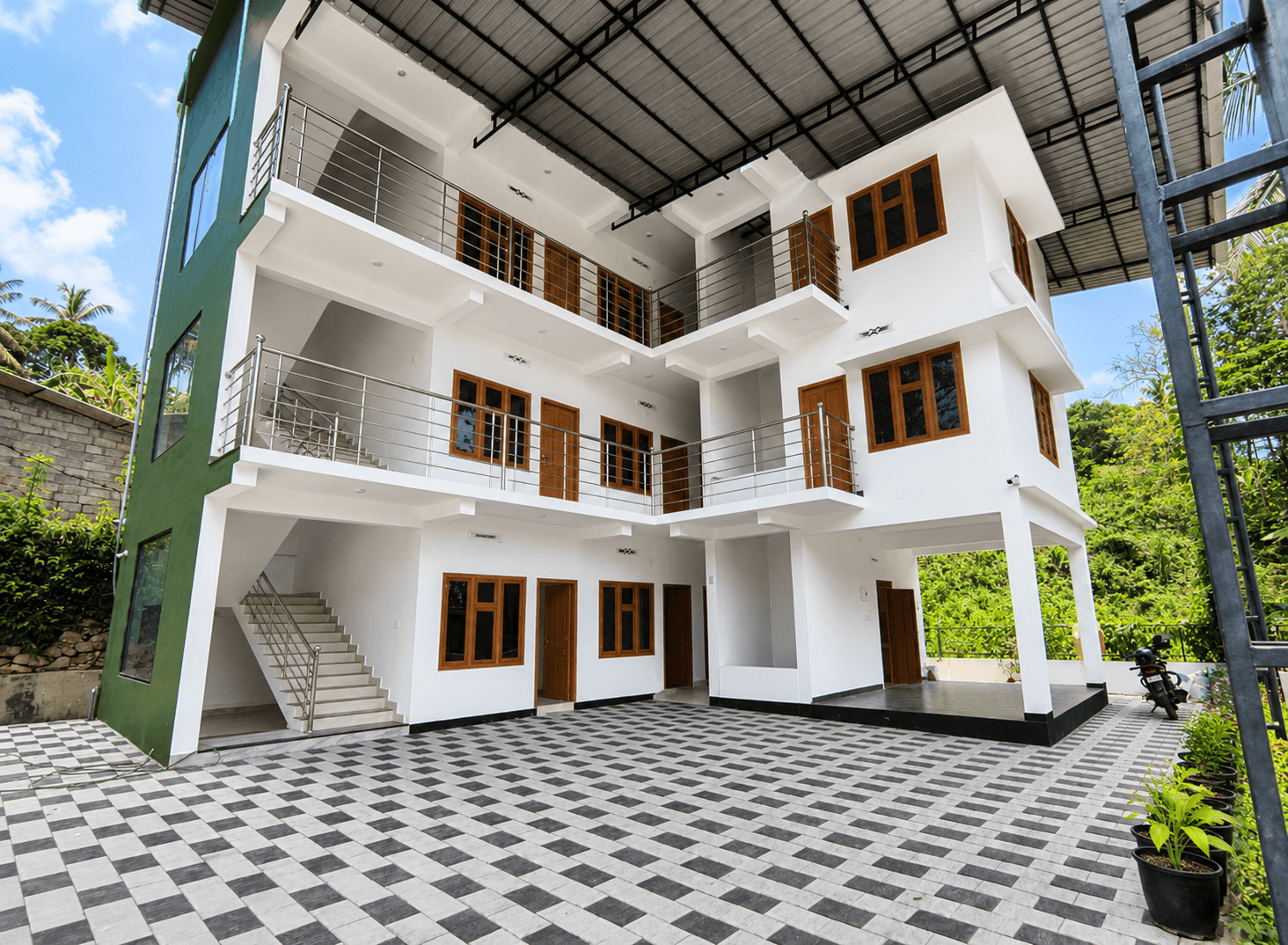 Premium Room Interior with Nature View at Green Field Apartments Wayanad
